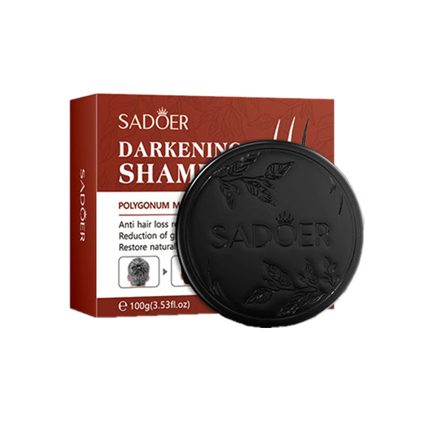 Black shampoo bar with Sadoer packaging on a white background