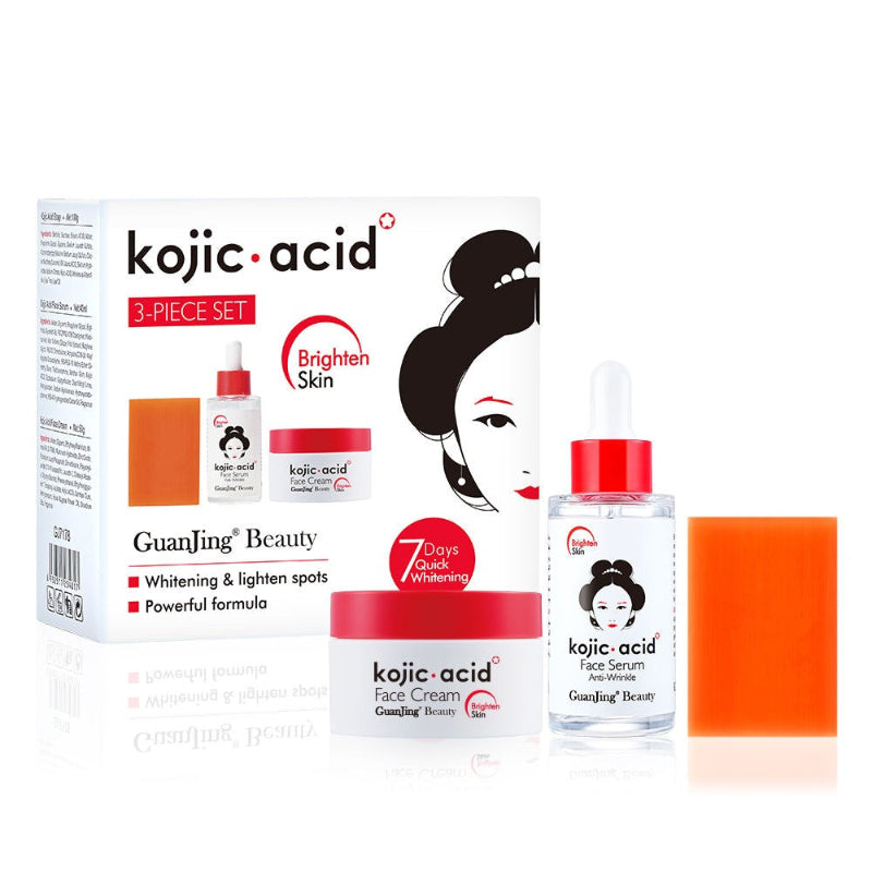 Kojic acid skincare set with cream, serum, and packaging on a white background