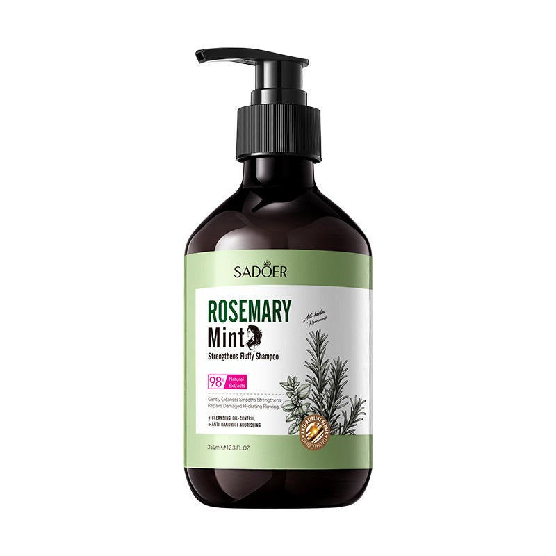 Shampoo bottle with rosemary and mint label on a white background
