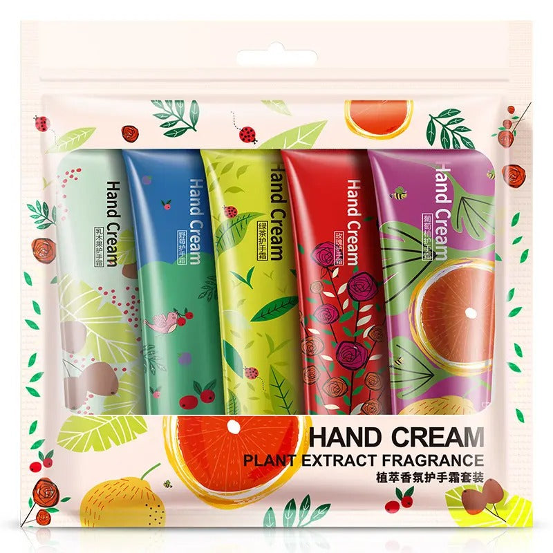 Set of hand cream tubes with colorful packaging on a decorative background