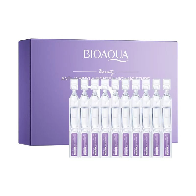 BIOAQUA skincare product set with ampoules and packaging on a white background