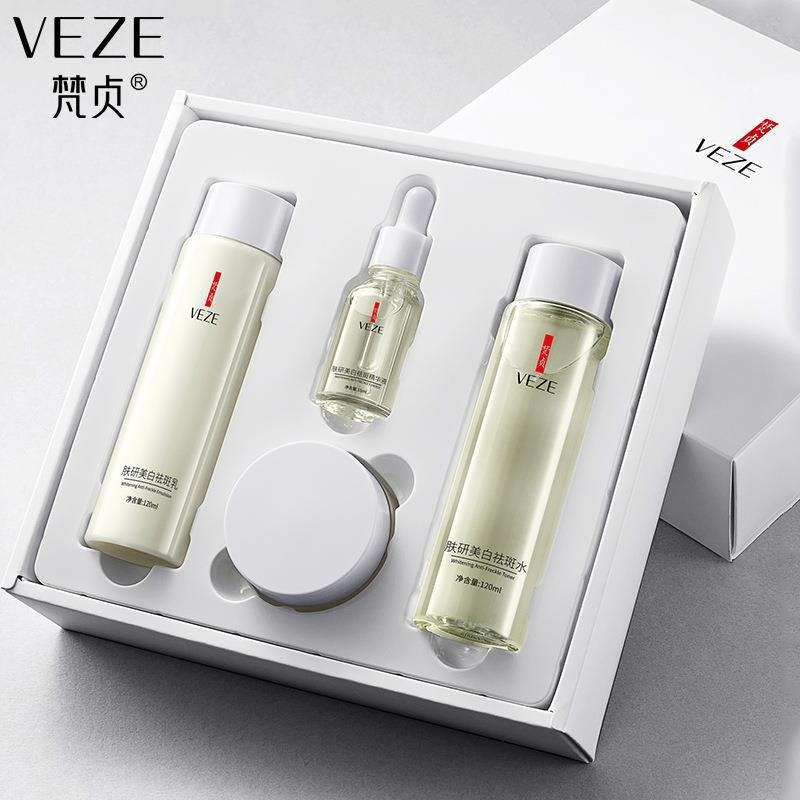 VEZE skincare product set in a box on a gray background