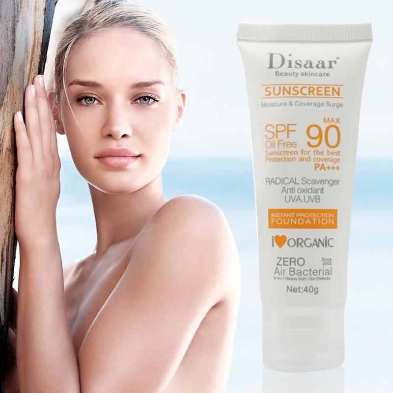 A tube of DISAAR Whitening Sunblock Skin Protective SunScreen with SPF-90; labeled as organic olive oil-based with 0.45g/13g of the product shown in a picture with a woman.